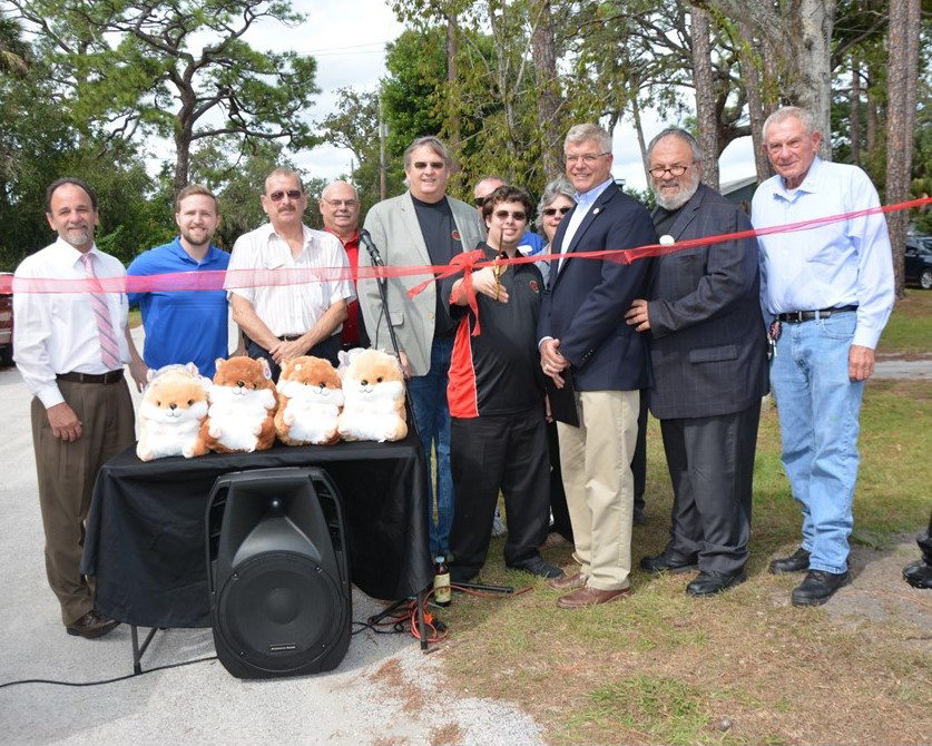 City and company officials gather to celebrate the naming of Whac-A-Mole Way in Holly Hill.
