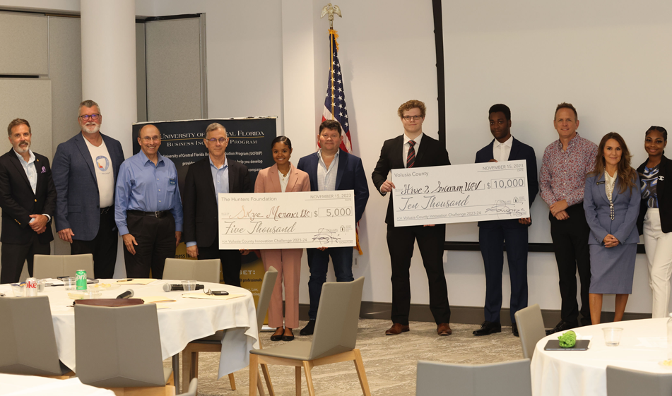 2023 Volusia County Innovation Challenge - In the picture: Left to Right - Lou Paris, Barry Boatner, Jack Phifer, Dr. Amir Kahani, Skye Shapiro-Simmons, William Sanchez, Alex Gardner, Nyameaama Gambrah, Kevin Manley, Connie Garzon, Asia Mashore